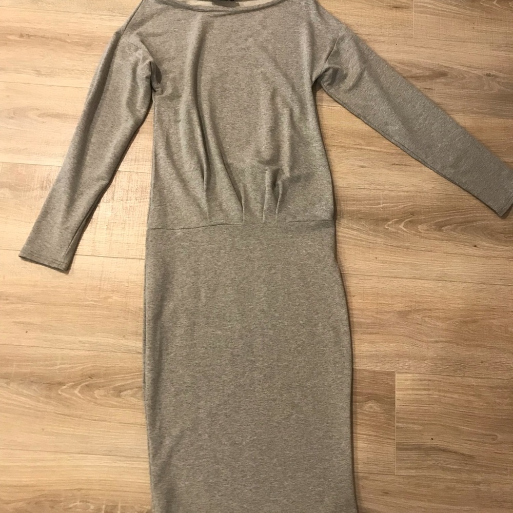 European shirt dress meant to gather at the waist.